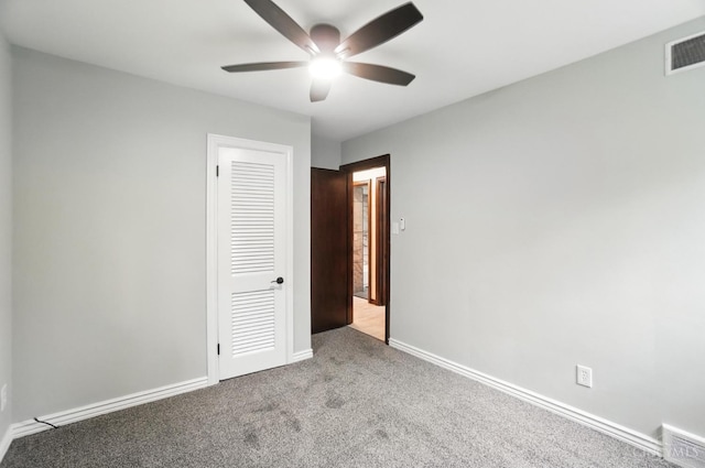 2000 Neeb Rd, Green Twp, OH 45233 - unfurnished bedroom with carpet, a closet, and a ceiling fan