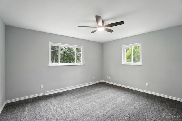 2000 Neeb Rd, Green Twp, OH 45233 - unfurnished room featuring a ceiling fan, healthy amount of natural light, and dark carpet
