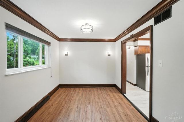 2000 Neeb Rd, Green Twp, OH 45233 - empty room with crown molding and light wood-type flooring