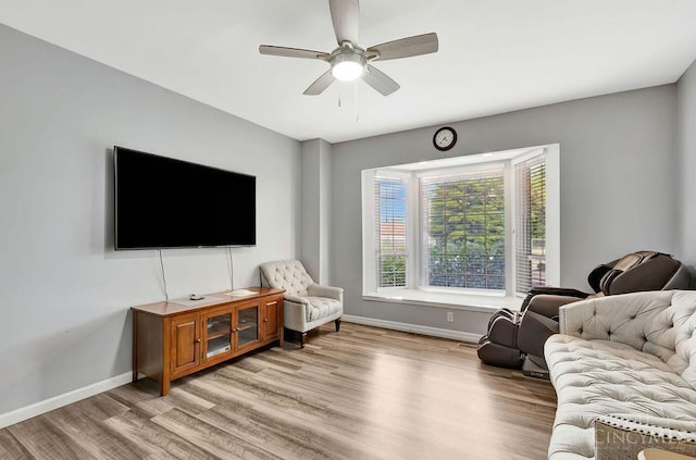 711 Van Roberts Pl, Wyoming, OH 45215 - living area with light wood finished floors and ceiling fan