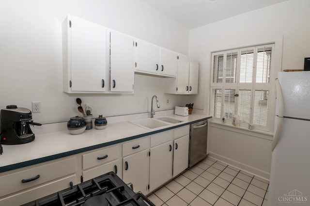 2851 Pine Grove Ave, Cincinnati, OH 45208 - kitchen featuring freestanding refrigerator, stainless steel dishwasher, white cabinets, and light countertops