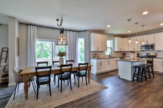 6352 Copperleaf Ln, Miami Twp, OH 45140 - dining space featuring dark wood finished floors and recessed lighting