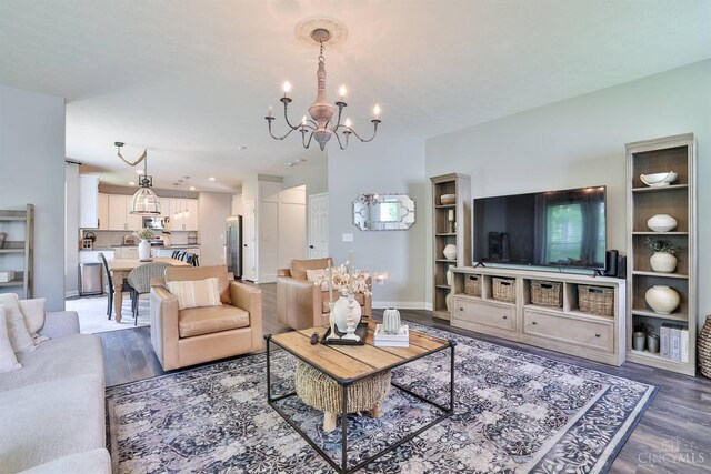6352 Copperleaf Ln, Miami Twp, OH 45140 - living area featuring a chandelier and wood finished floors