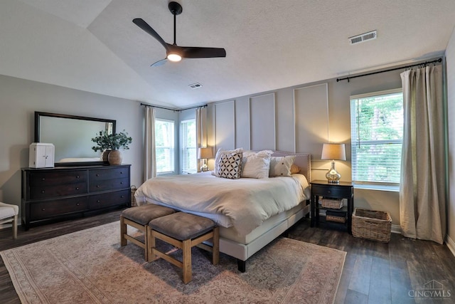 6352 Copperleaf Ln, Miami Twp, OH 45140 - bedroom featuring dark wood finished floors, multiple windows, vaulted ceiling, and a ceiling fan
