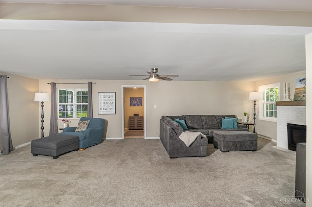 4 Brooklyn Ln, Miami Twp, OH 45150 - carpeted living area with a fireplace and a ceiling fan
