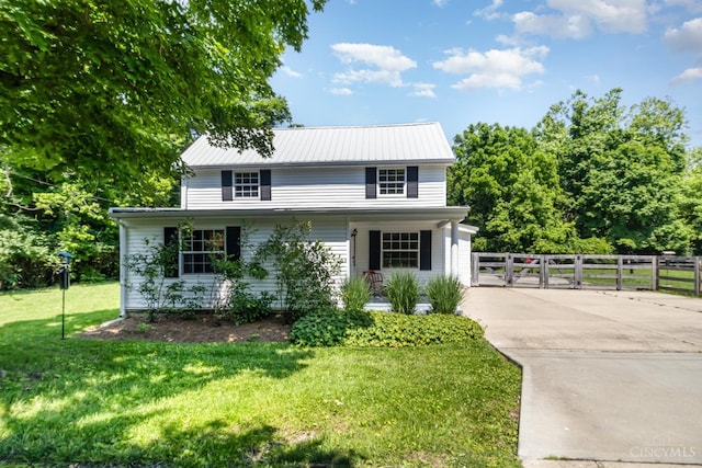 4 Brooklyn Ln, Miami Twp, OH 45150 - traditional-style home featuring a gate, covered porch, a metal roof, and driveway
