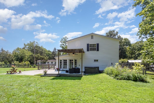 4 Brooklyn Ln, Miami Twp, OH 45150 - back of property with ceiling fan, a deck, french doors, and a hot tub