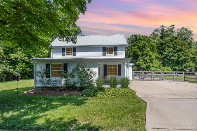 4 Brooklyn Ln, Miami Twp, OH 45150 - traditional-style home featuring a gate, covered porch, a metal roof, and driveway