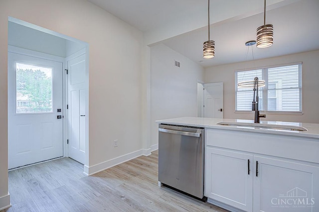 3104 Celeron Ave, Cincinnati, OH 45209 - kitchen with dishwasher, light wood finished floors, plenty of natural light, and white cabinets