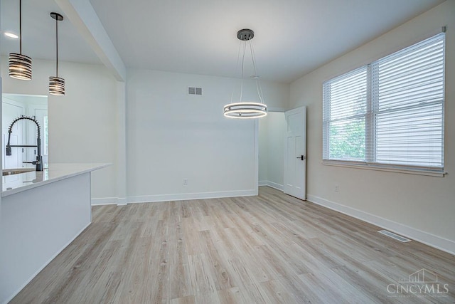3104 Celeron Ave, Cincinnati, OH 45209 - unfurnished dining area featuring light wood-type flooring
