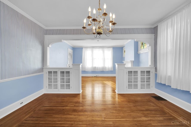 3459 Alta Vista Ave, Cheviot, OH 45211 - unfurnished dining area with wood finished floors, a chandelier, and crown molding
