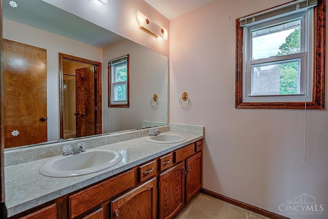 2974 Acer Ct, Ross Twp, OH 45013 - bathroom with plenty of natural light, double vanity, and a shower with shower curtain