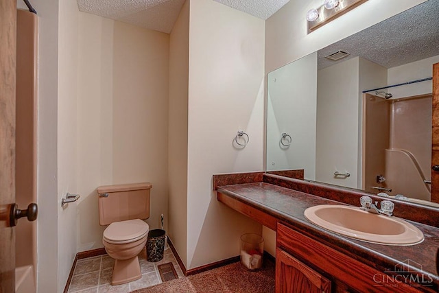 2974 Acer Ct, Ross Twp, OH 45013 - bathroom with a textured ceiling, vanity, and a shower