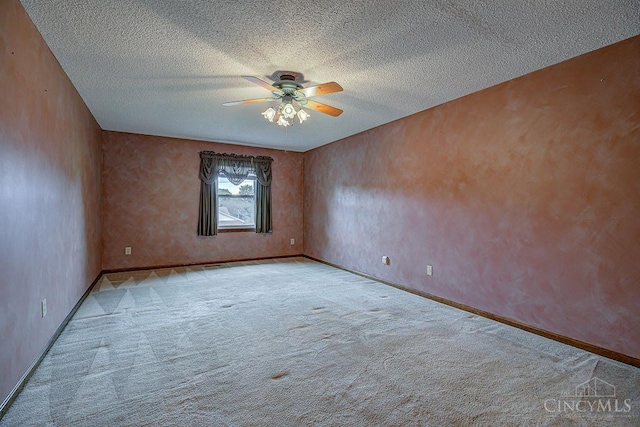 2974 Acer Ct, Ross Twp, OH 45013 - unfurnished room with a ceiling fan, carpet flooring, and a textured ceiling