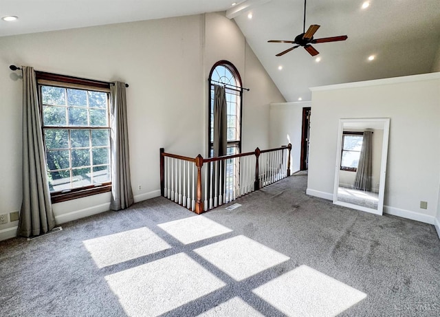 254 Compton Rd, Wyoming, OH 45215 - carpeted empty room featuring plenty of natural light, recessed lighting, high vaulted ceiling, a ceiling fan, and beamed ceiling