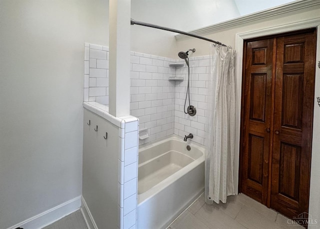 254 Compton Rd, Wyoming, OH 45215 - bathroom featuring shower / bath combo with shower curtain and tile patterned flooring