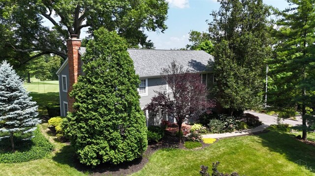 254 Compton Rd, Wyoming, OH 45215 - view of side of property featuring a chimney and a yard
