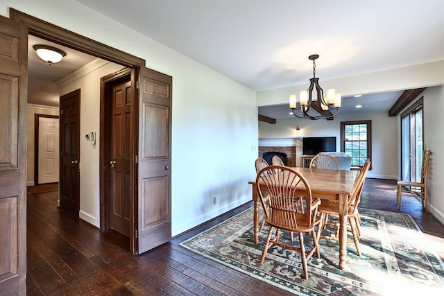 254 Compton Rd, Wyoming, OH 45215 - dining space featuring a chandelier, dark wood-style floors, and ornamental molding