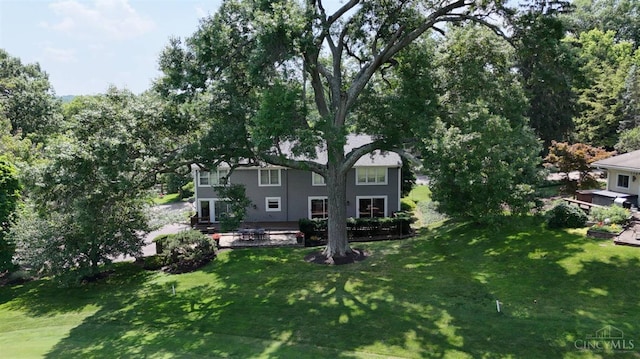 254 Compton Rd, Wyoming, OH 45215 - view of grassy yard featuring a patio area