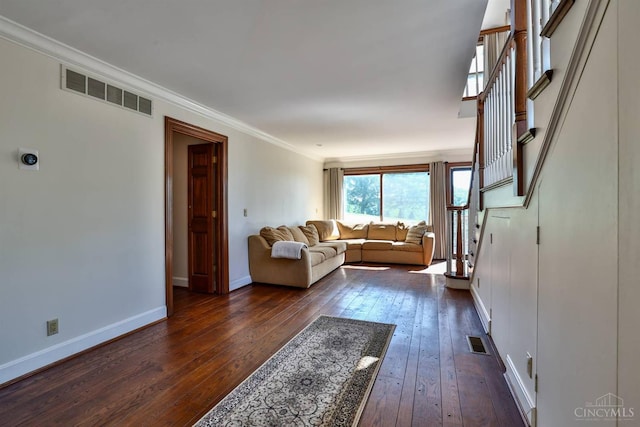 254 Compton Rd, Wyoming, OH 45215 - living area featuring dark wood-style flooring, stairs, and crown molding
