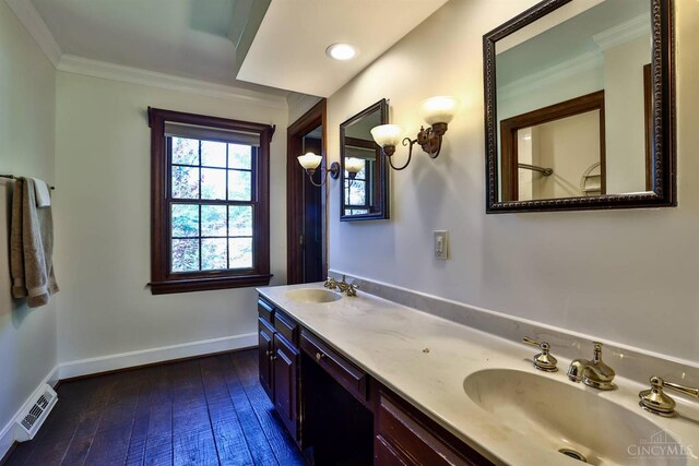 254 Compton Rd, Wyoming, OH 45215 - full bathroom featuring ornamental molding, double vanity, and hardwood / wood-style floors