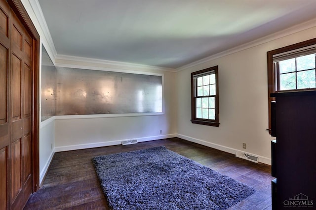 254 Compton Rd, Wyoming, OH 45215 - unfurnished room with dark wood-type flooring, healthy amount of natural light, and ornamental molding