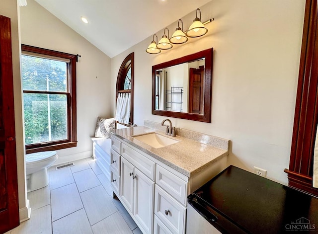 254 Compton Rd, Wyoming, OH 45215 - bathroom featuring vanity, vaulted ceiling, recessed lighting, and tile patterned flooring