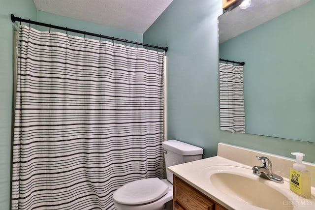 2487 Haddock Dr, Lawrenceburg, IN 47025 - full bath featuring vanity, a textured ceiling, and a shower with shower curtain