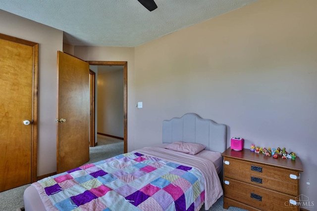 2487 Haddock Dr, Lawrenceburg, IN 47025 - carpeted bedroom featuring a textured ceiling and ceiling fan