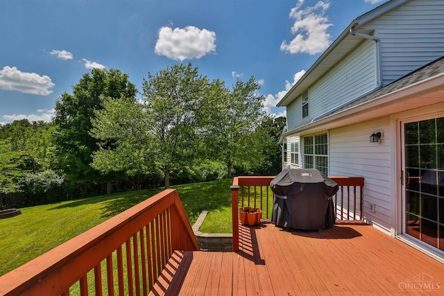 2487 Haddock Dr, Lawrenceburg, IN 47025 - wooden deck with grilling area and a lawn