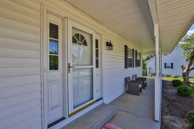 2487 Haddock Dr, Lawrenceburg, IN 47025 - doorway to property featuring covered porch