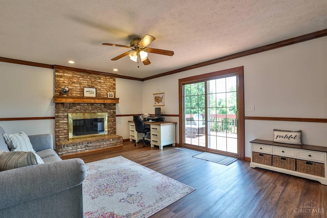 2487 Haddock Dr, Lawrenceburg, IN 47025 - living area with a ceiling fan, a desk, crown molding, dark wood-style floors, and a textured ceiling