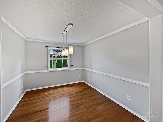 6336 Lansing Ct, Liberty Twp, OH 45011 - spare room featuring wood finished floors, ornamental molding, and a textured ceiling