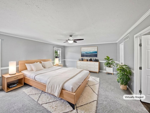 6336 Lansing Ct, Liberty Twp, OH 45011 - carpeted bedroom with a textured ceiling, ceiling fan, and crown molding