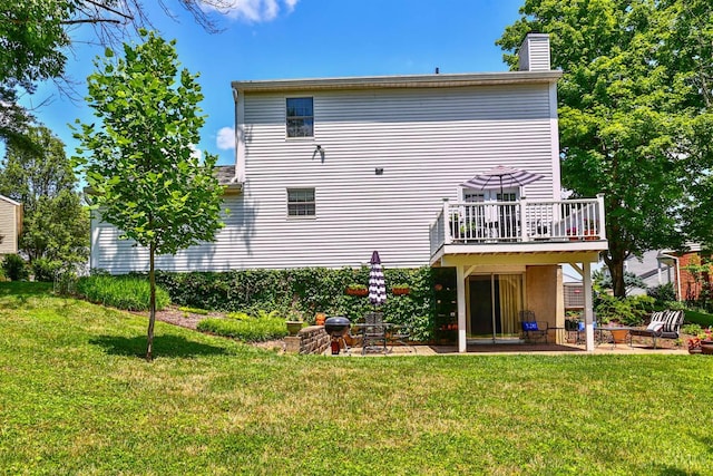 8050 Redhaven Ct, Colerain Twp, OH 45247 - rear view of property with a patio area, a chimney, a yard, and a balcony