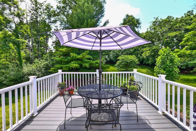 8050 Redhaven Ct, Colerain Twp, OH 45247 - deck with outdoor dining space and view of scattered trees