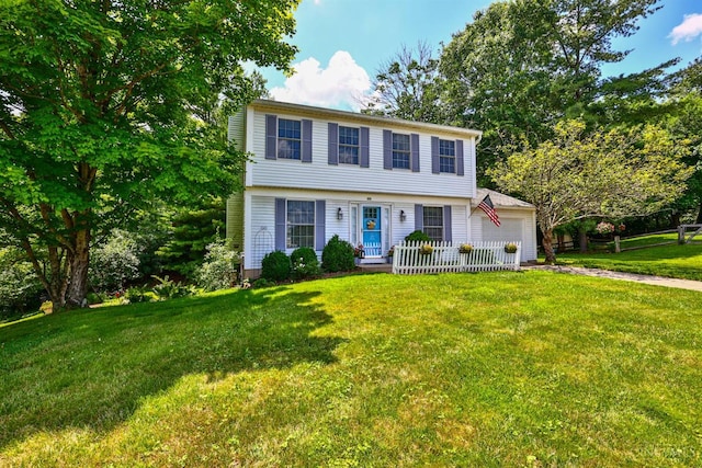 8050 Redhaven Ct, Colerain Twp, OH 45247 - colonial inspired home with a garage, a front lawn, and driveway