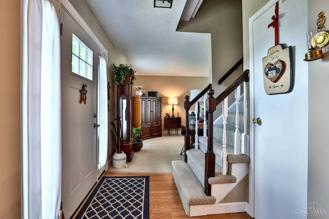 8050 Redhaven Ct, Colerain Twp, OH 45247 - foyer entrance with stairway and wood finished floors