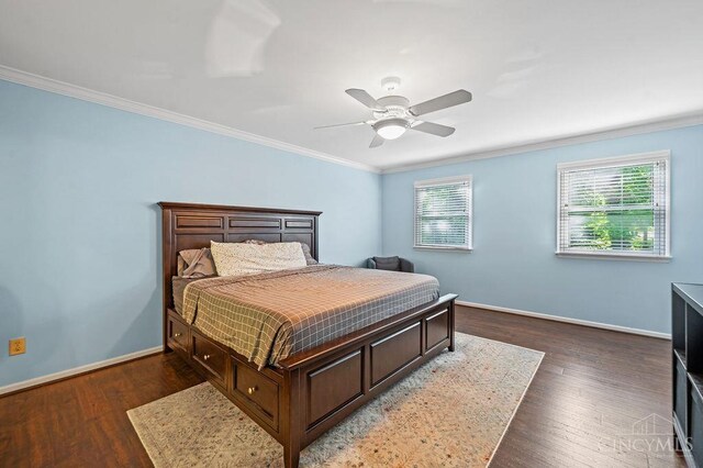 7029 Stonington Rd, Anderson Twp, OH 45230 - bedroom with crown molding, multiple windows, wood finished floors, and a ceiling fan