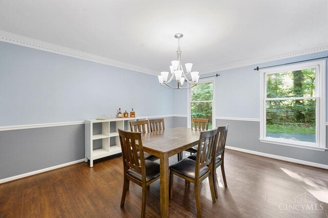 7029 Stonington Rd, Anderson Twp, OH 45230 - dining area featuring a chandelier, wood finished floors, and crown molding