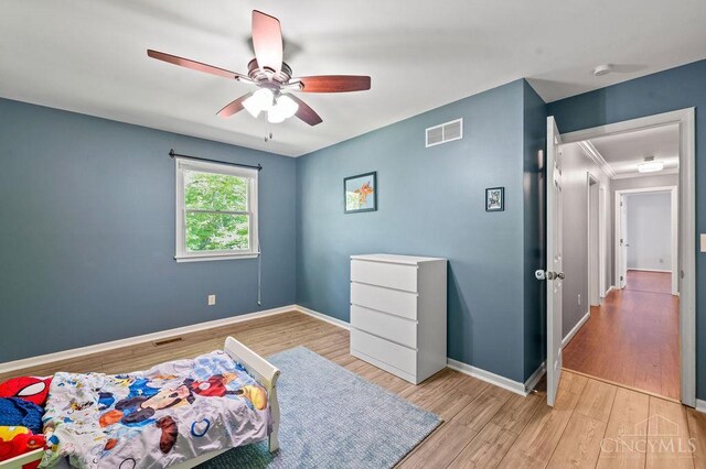 7029 Stonington Rd, Anderson Twp, OH 45230 - bedroom with wood finished floors and ceiling fan