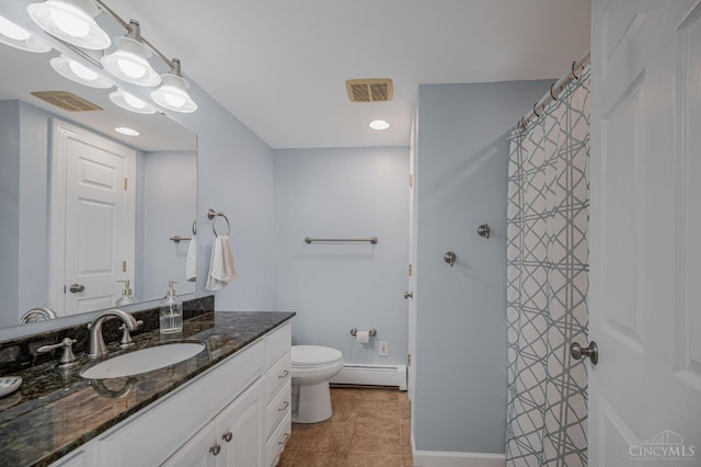 854 Nordyke Rd, Anderson Twp, OH 45255 - bathroom with vanity, a baseboard heating unit, tile patterned floors, a shower with curtain, and recessed lighting