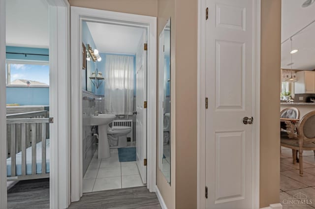 854 Nordyke Rd, Anderson Twp, OH 45255 - hall featuring tile patterned flooring and a sink