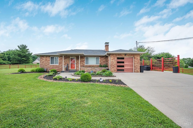 854 Nordyke Rd, Anderson Twp, OH 45255 - view of front of home featuring driveway, a garage, a chimney, and brick siding
