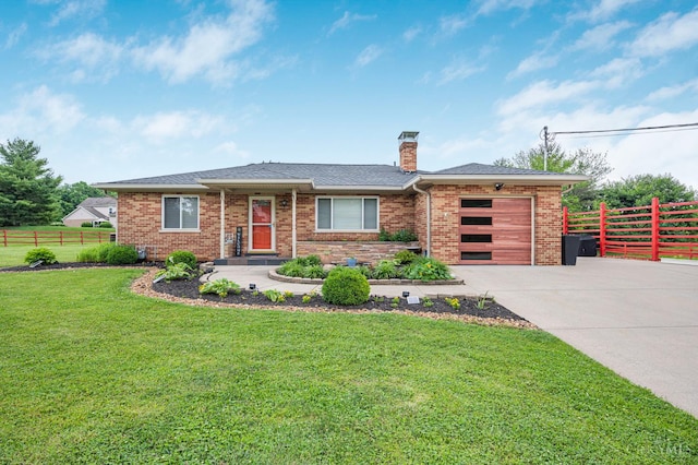 854 Nordyke Rd, Anderson Twp, OH 45255 - view of front of property with concrete driveway, an attached garage, a chimney, and brick siding