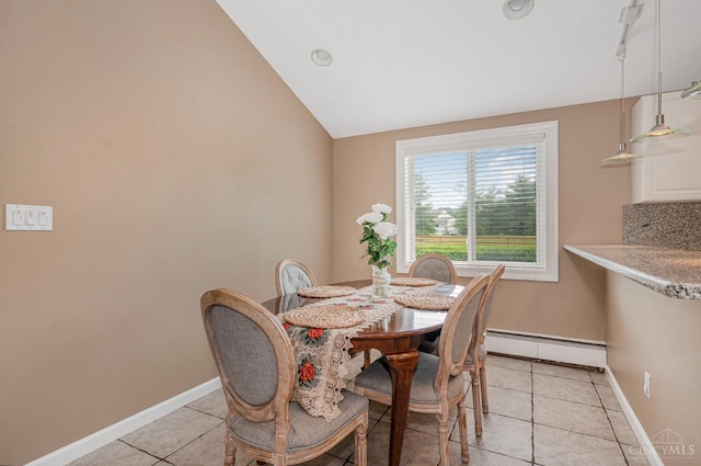 854 Nordyke Rd, Anderson Twp, OH 45255 - dining space featuring baseboard heating, light tile patterned flooring, and lofted ceiling