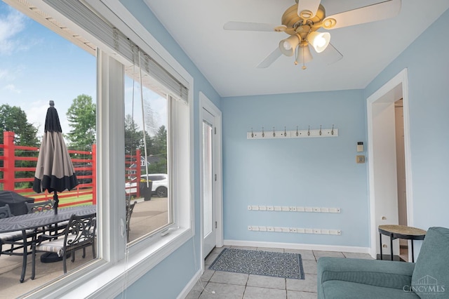 854 Nordyke Rd, Anderson Twp, OH 45255 - doorway to outside with a ceiling fan and tile patterned floors
