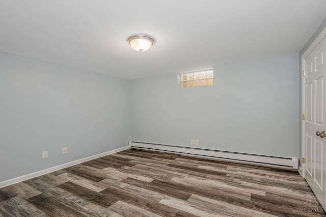 854 Nordyke Rd, Anderson Twp, OH 45255 - spare room featuring baseboard heating and dark wood-style flooring