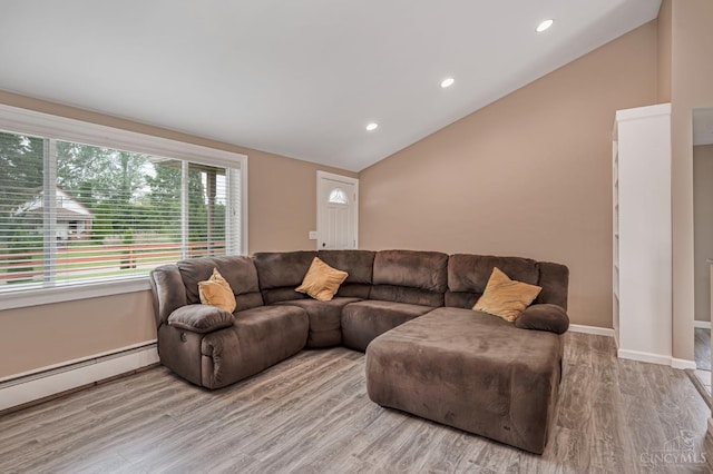 854 Nordyke Rd, Anderson Twp, OH 45255 - living area featuring a baseboard radiator, vaulted ceiling, wood finished floors, and recessed lighting