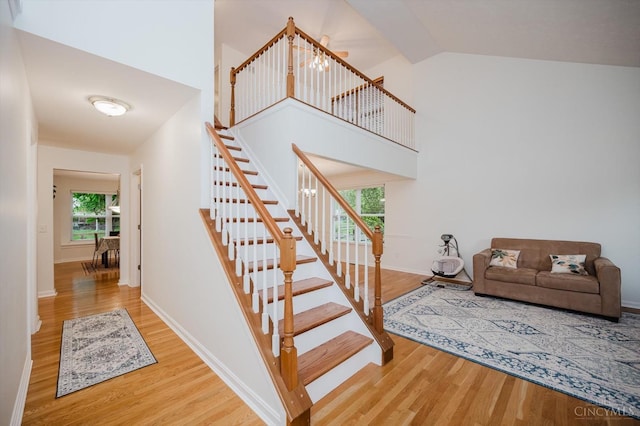 5815 Running Fox Ln, Mason, OH 45040 - staircase with wood finished floors and lofted ceiling